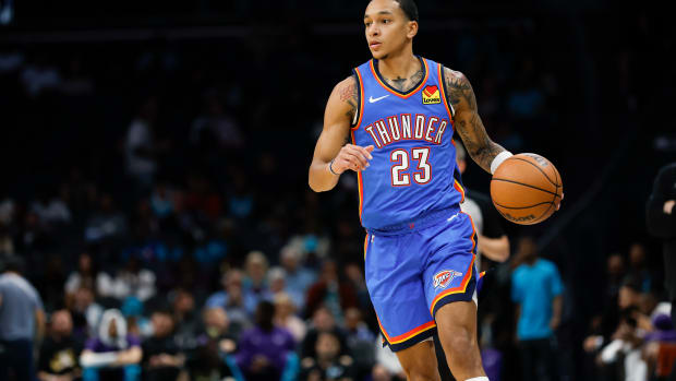 Oct 15, 2023; Charlotte, North Carolina, USA; Oklahoma City Thunder guard Tre Mann (23) brings the ball up court against the Charlotte Hornets in the first half at Spectrum Center.
